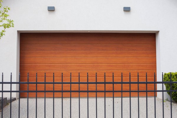 closeup-shot-of-brown-sectional-garage-doors-for-c-2022-12-23-00-10-44-utc (1)