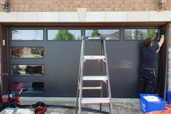 black wide garage door installation